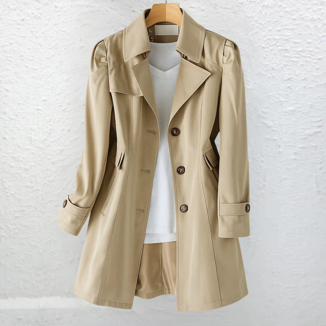 Back view of the Estelle elegant summer trench coat, highlighting the clean lines and belt detail.