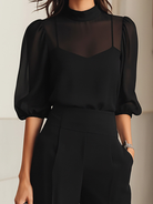 Back view of the Evelyn three-piece ensemble, showing the full length of the wide-leg pants and the sheer top.