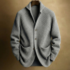 Texture shot of the ribbed knit fabric on the Florian wool cardigan, showing material quality.