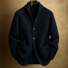 Back view of the Florian men's wool cardigan, illustrating the consistent fabric and drape.