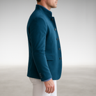 A man adjusting the cuff of the Florian tailored everyday blazer, focusing on the sleeve and button details.