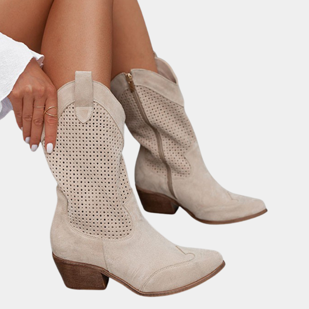 Close-up detail of the premium synthetic leather texture and pointed toe design of the orthopedic cowboy boots.