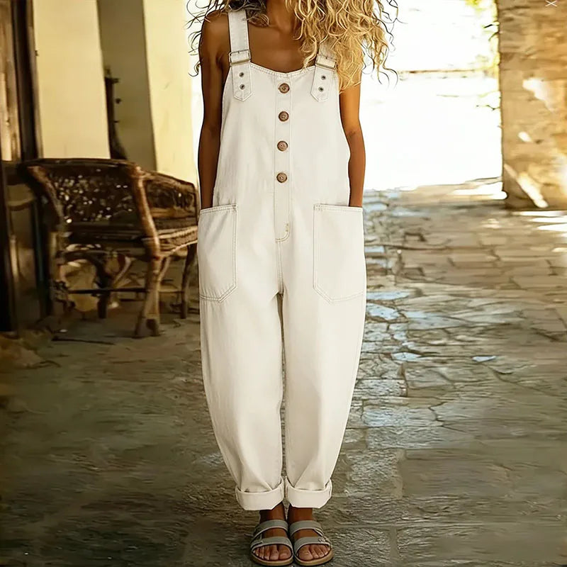 Back view of the Hadley soft denim overalls on a model, emphasizing the overall design and practical pocket placement.