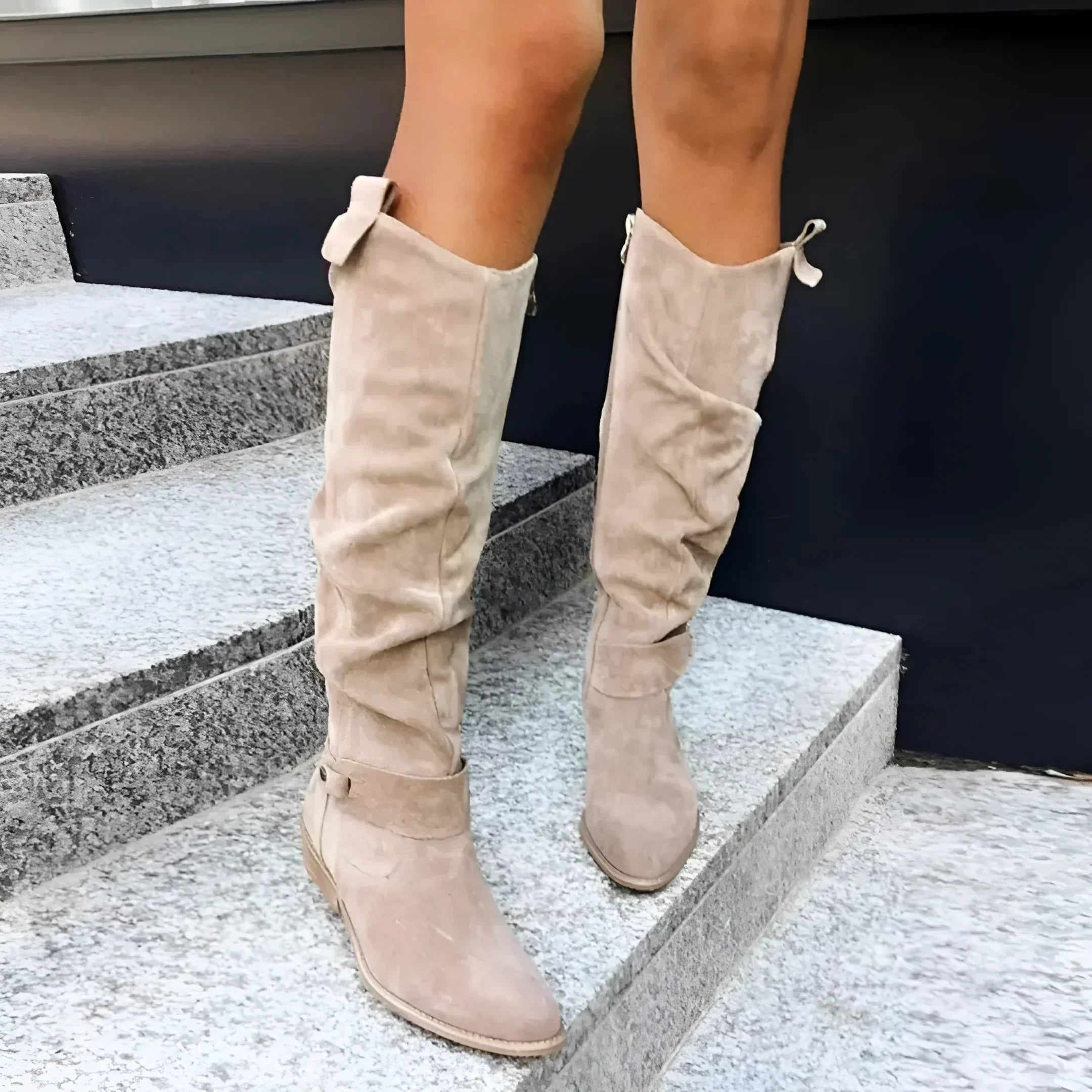 Close-up of the elegant dark brown Kalina knee-high suede boots, highlighting the soft texture and precise stitching.