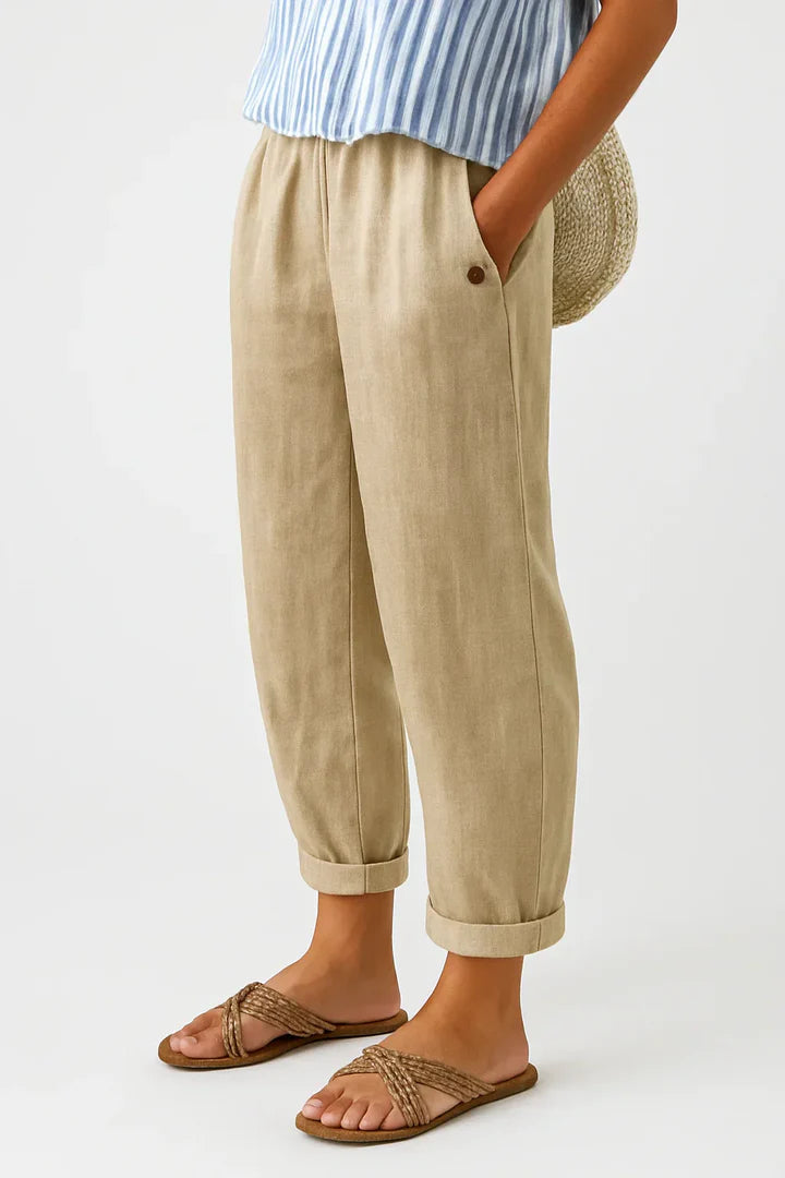 Front view of Kallista linen-cotton blend trousers in a light beige color, showcasing the relaxed fit.