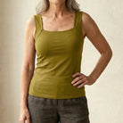 Overhead shot of the olive green Keisha comfort bra tanktop laid out.