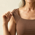 Close-up of the fabric texture on the olive green Keisha comfort bra tanktop, emphasizing its softness.