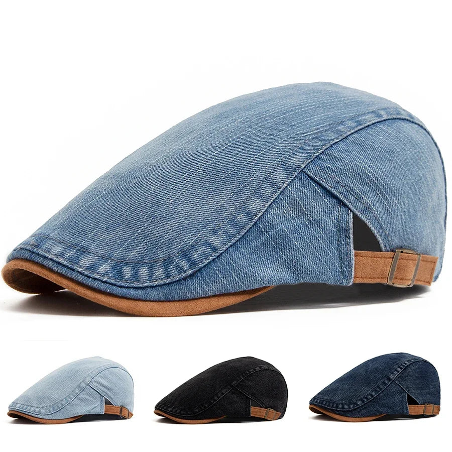Front view of a dark blue premium denim flat cap, showcasing its classic shape and textured fabric.