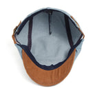 The interior lining of the Kian premium denim flat cap, illustrating the comfortable and breathable material.