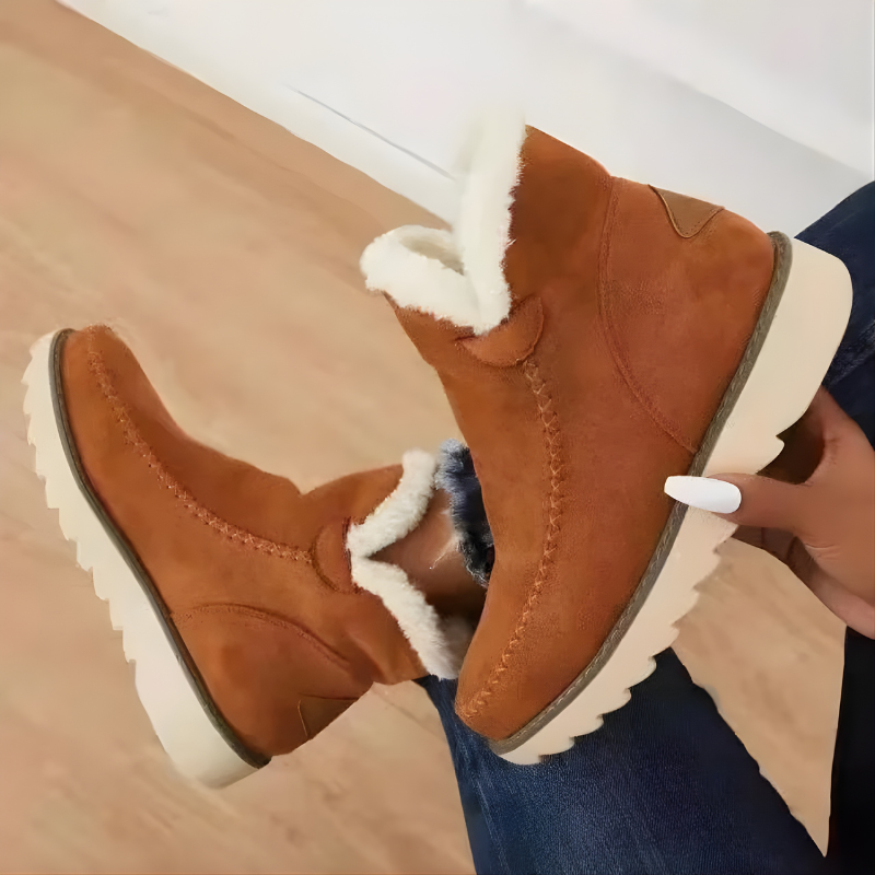 Detailed shot of the flexible outsole and orthopedic cushioning of a Kira ankle boot.