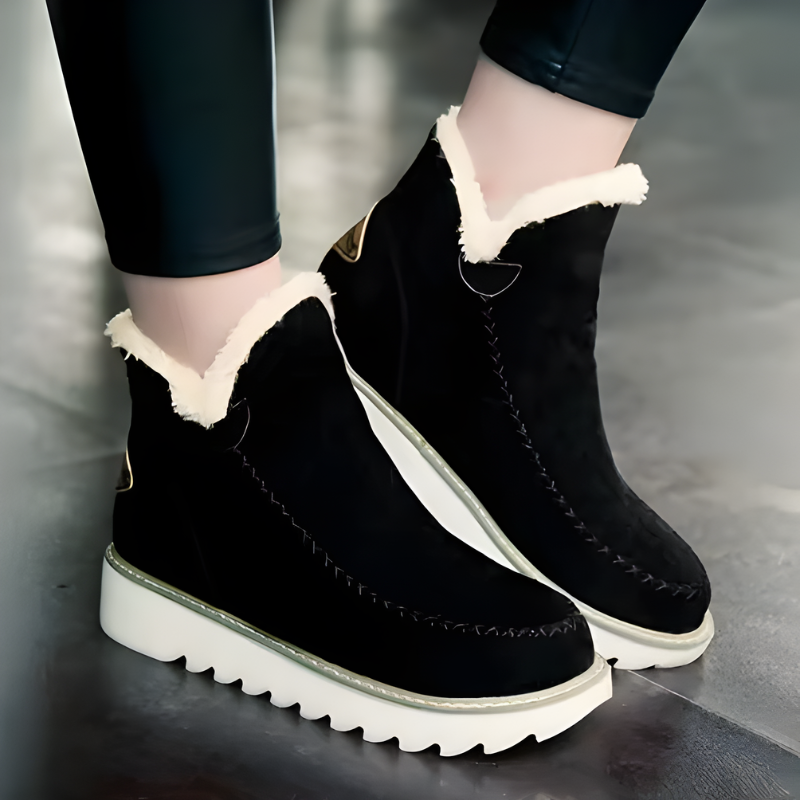 Top-down view of two Kira orthopedic ankle boots in different colors, showcasing the design.