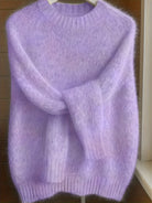 Close-up detail of the fine gauge knit texture on the shoulder of the purple Lila cashmere-blend sweater.
