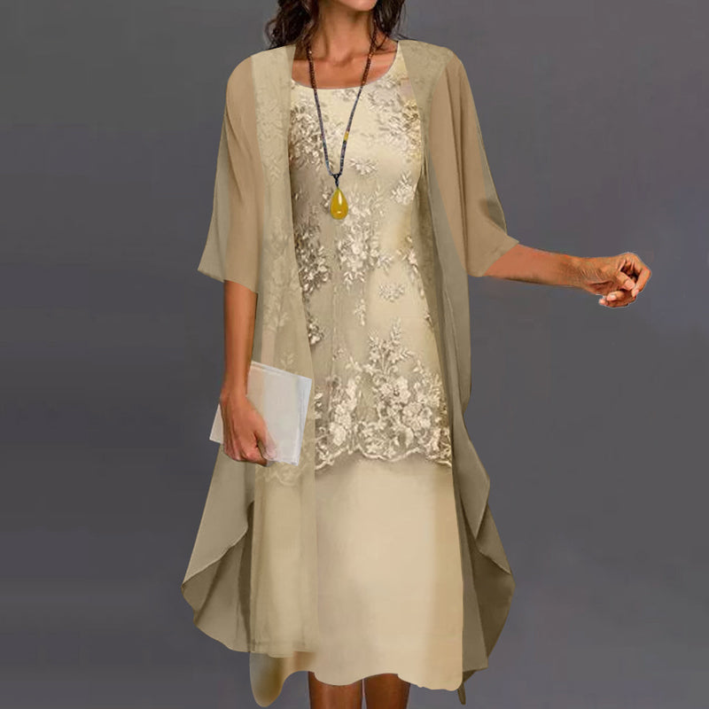 Back view of the yellow Lumi chiffon two-piece dress, showing the graceful movement of the skirt and top.