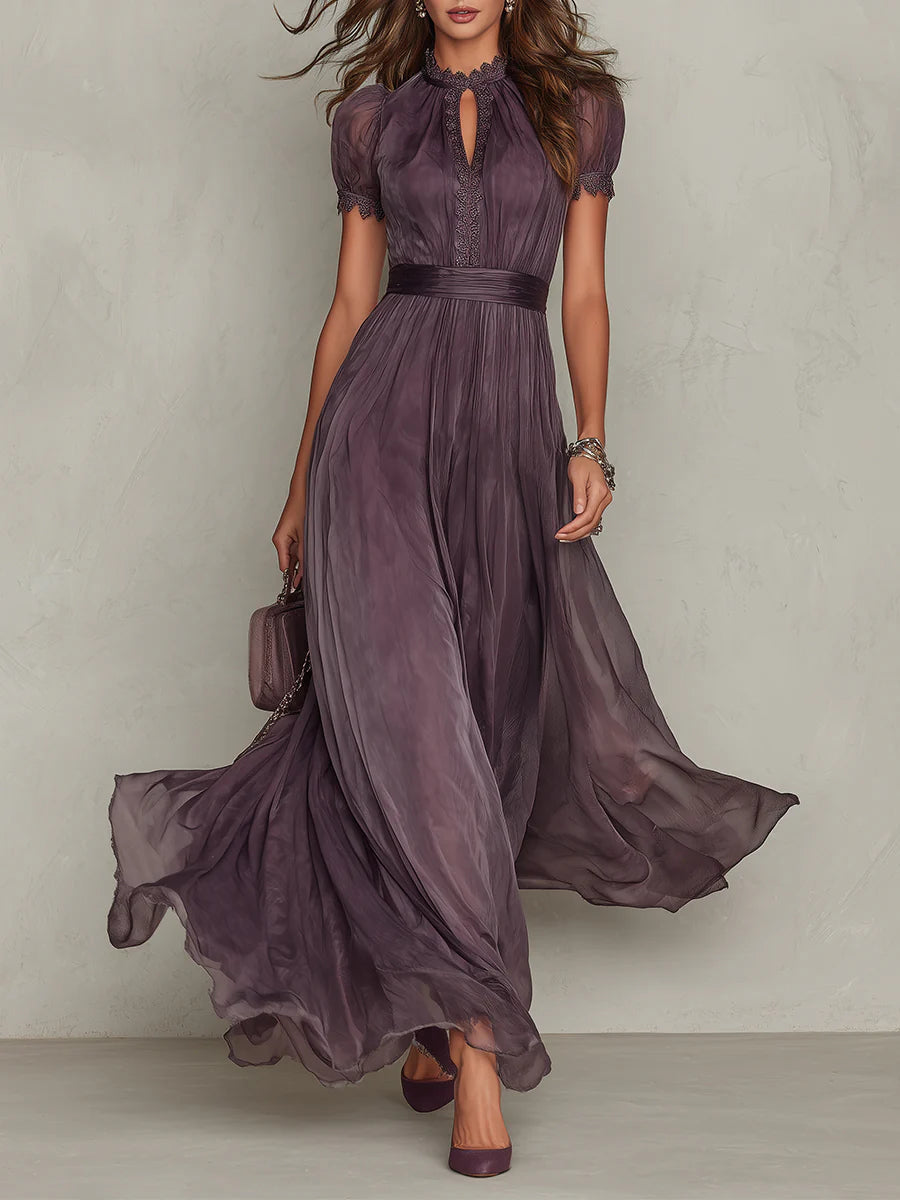 Front view of the Lyra purple chiffon lace maxi dress, showcasing the keyhole neckline and flowing skirt.