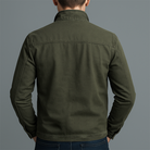 Close-up detail of the Matteo rugged thermal jacket's robust cotton-blend texture and sturdy stitching.