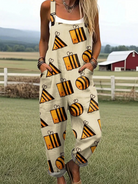 Front view of the Seraphina whimsical bee print jumpsuit on a model, showcasing its relaxed fit and graphic bee pattern on a light background.