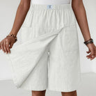 Back view of the black skort shorts, emphasizing the smooth fit and secure coverage.