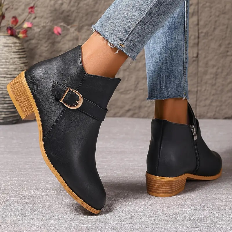 Frontal close-up of the black Zara comfort ankle boot, highlighting the soft-touch finish and toe shape.
