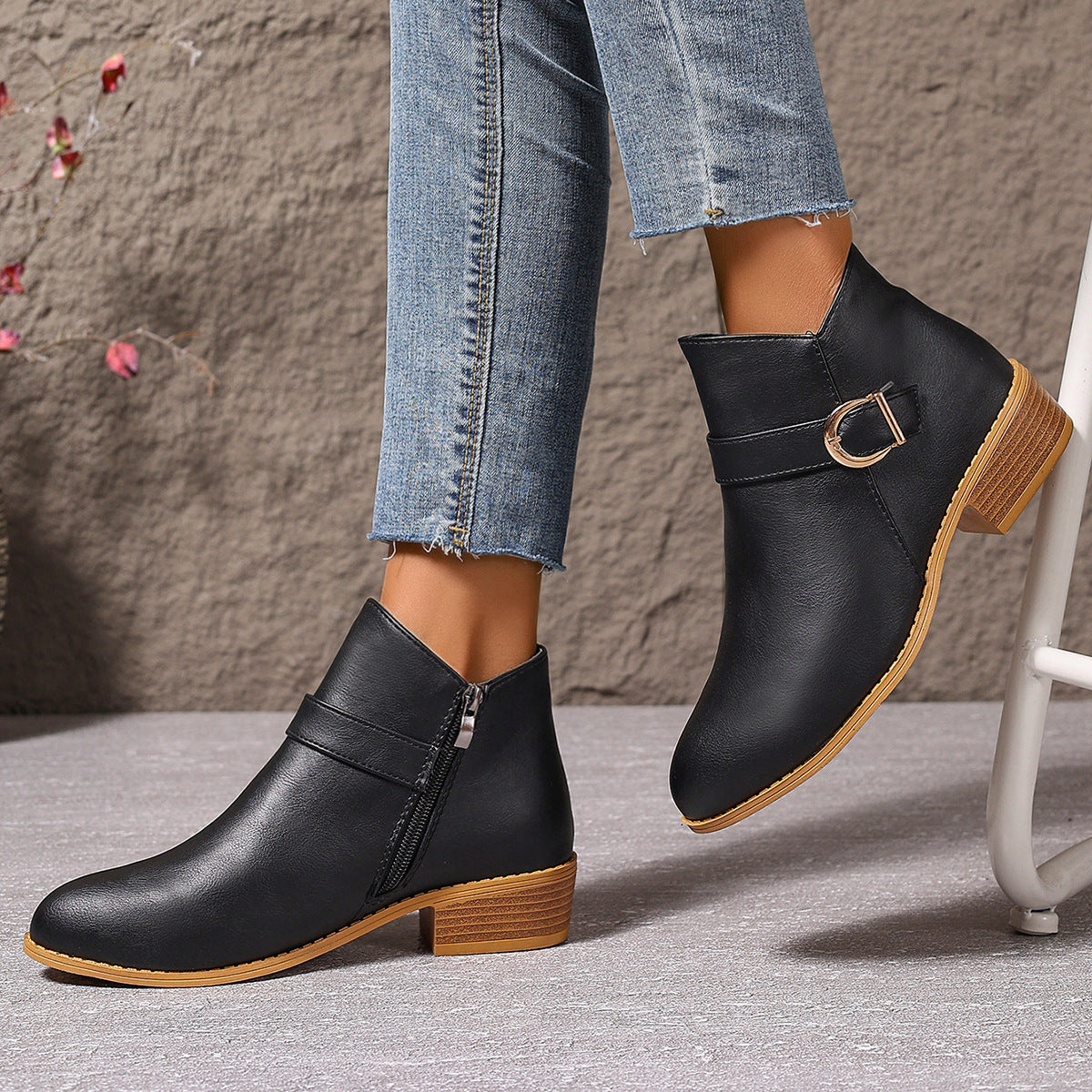 Detailed shot of the side zipper closure on the brown Zara comfort ankle boot, emphasizing ease of wear.