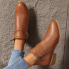 Three-quarter view of the brown Zara comfort ankle boot on a white background, highlighting its versatile style.